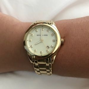 Gold MK watch